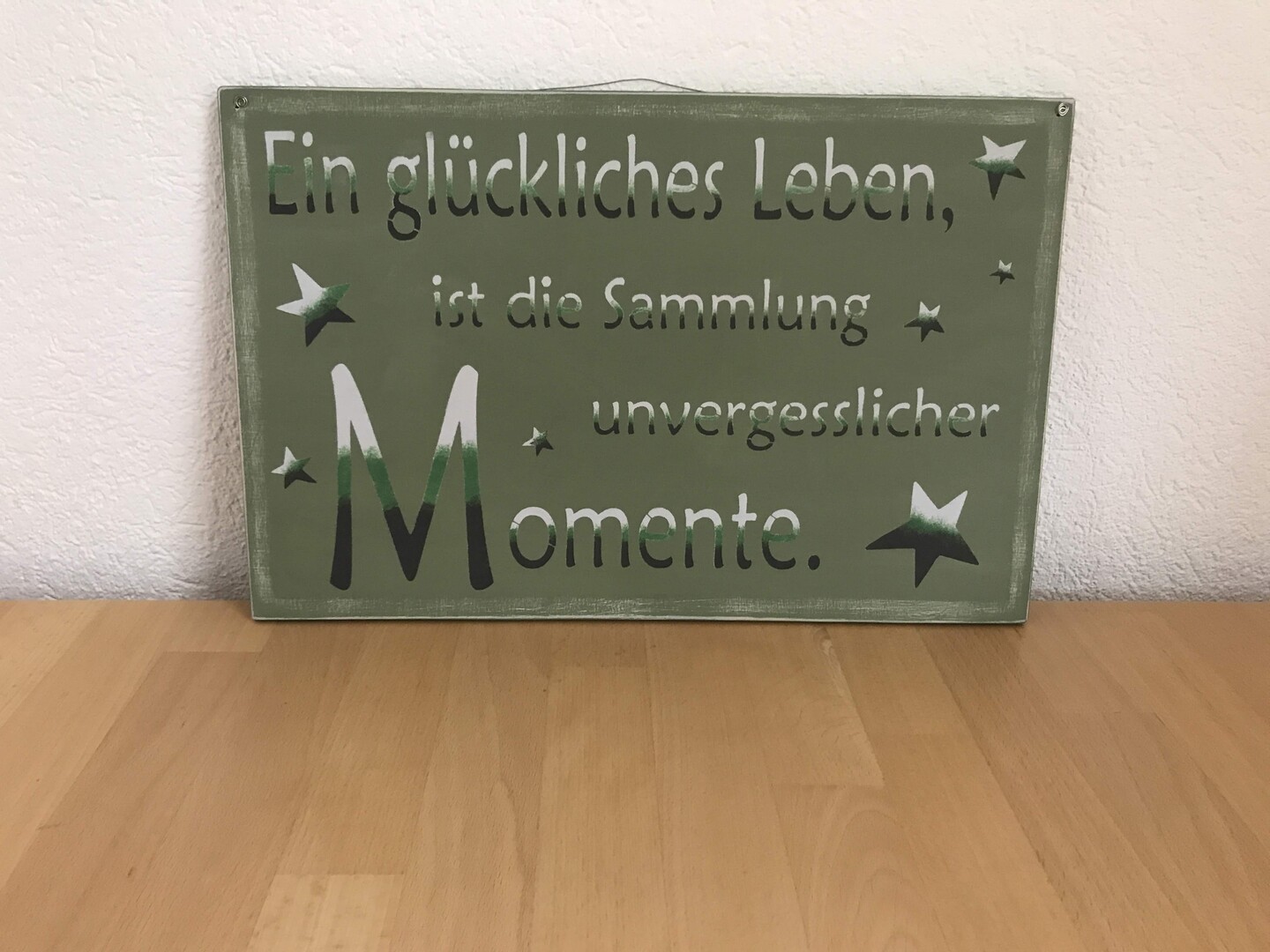 Holzschild "Ein glückliches Leben"